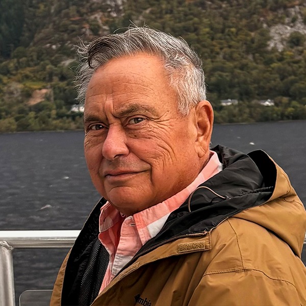 Trustee Aiau smiling