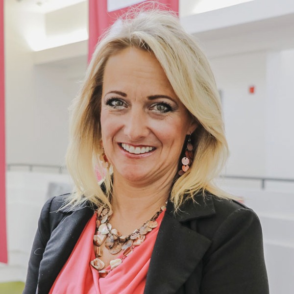 Trustee Peschek smiling