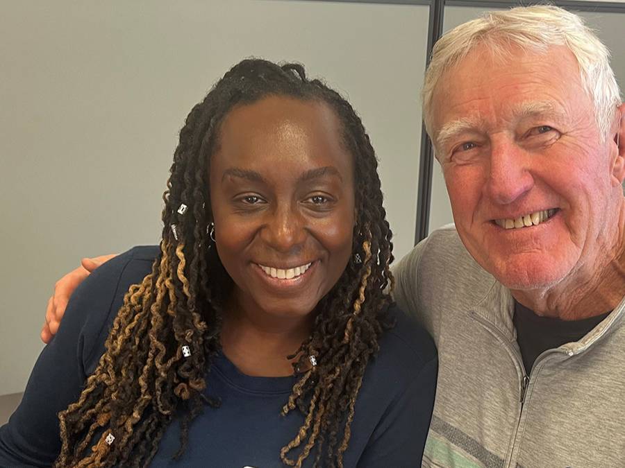 Be-Asia and Daryl Connell sitting, smiling