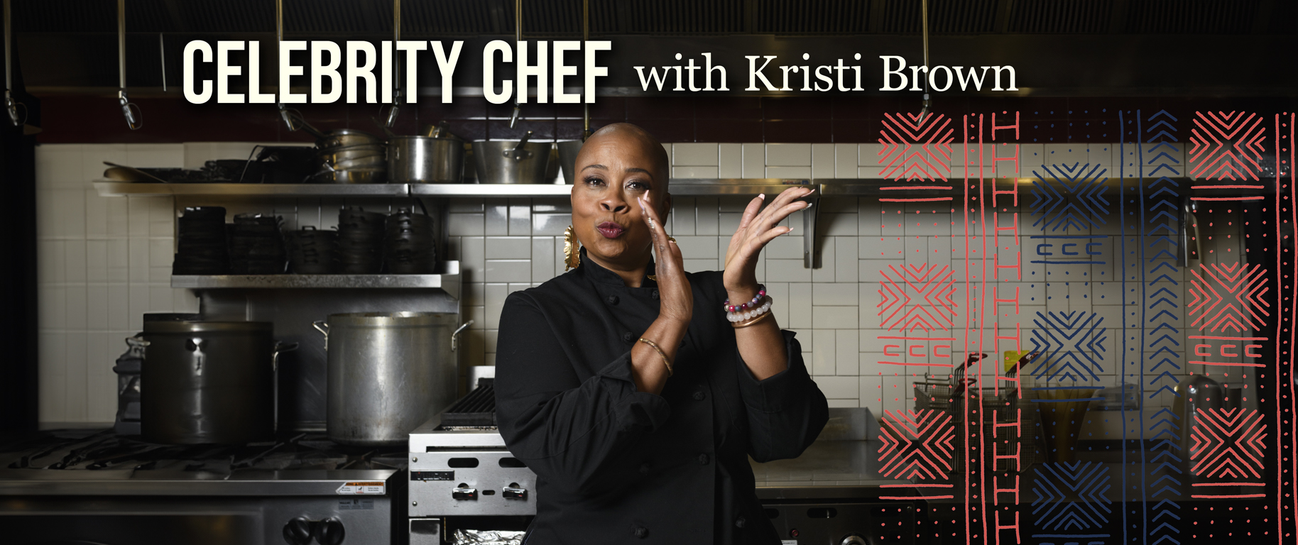 Celebrity Chef Kristi Brown standing in a kitchen smiling and clapping