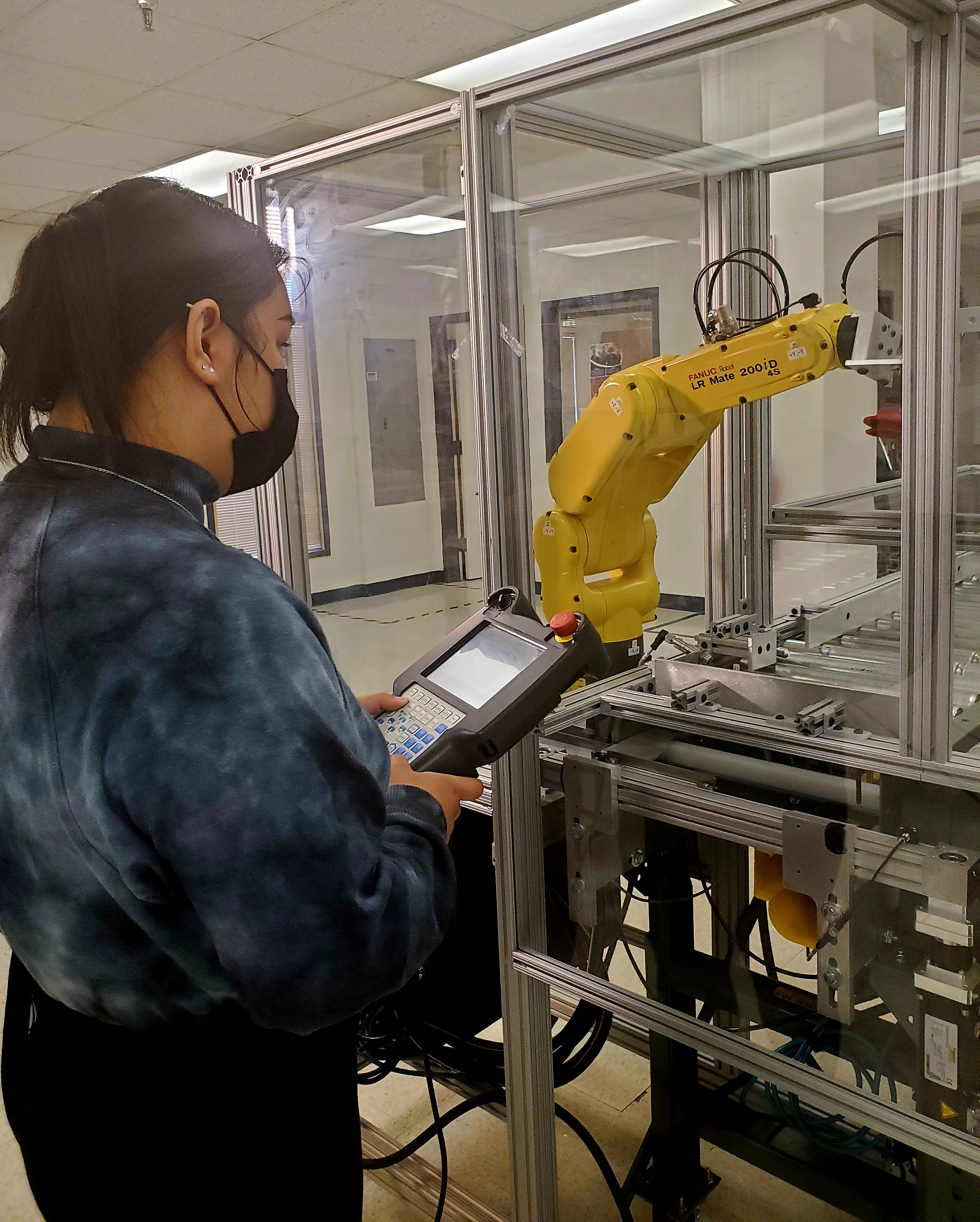 A student using a mechatronics device