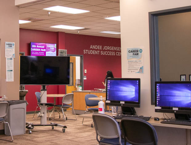 The inside of the Andee Jorgensen Student Success Center, featuring two computers