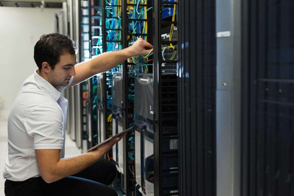 student working on servers